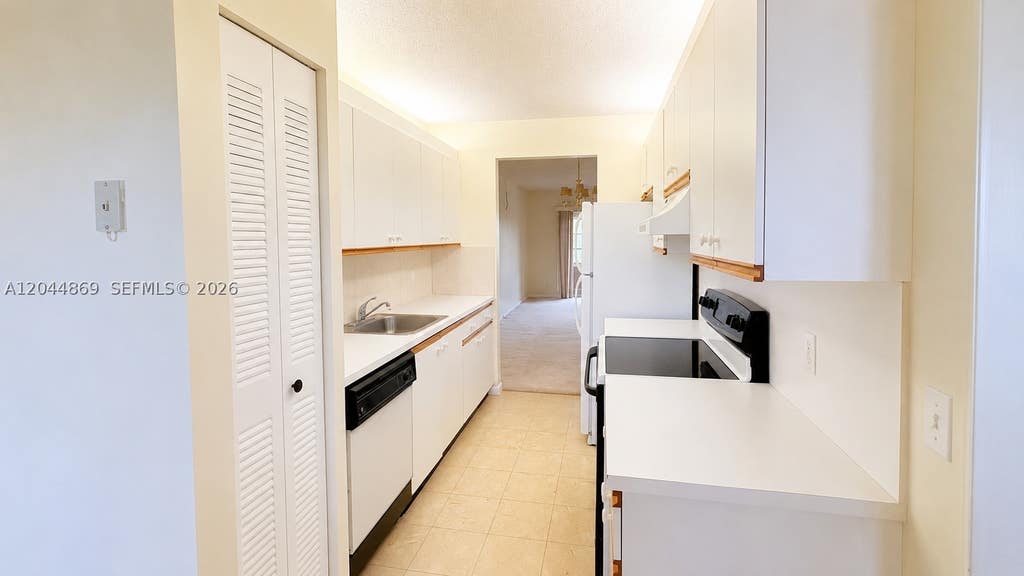 Photo of 12900 SW 13th St #413E, Pembroke Pines, FL 33027 (MLS # A12044869)
