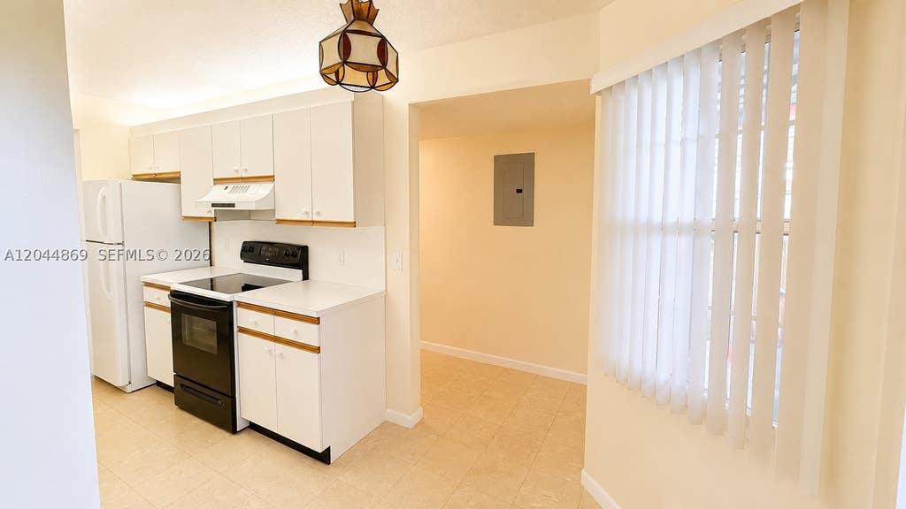 Photo of 12900 SW 13th St #413E, Pembroke Pines, FL 33027 (MLS # A12044869)