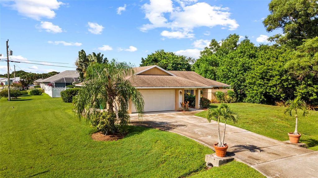 Photo of 515 SE Nome Dr, Port St Lucie, FL 34984 (MLS # A11890949)