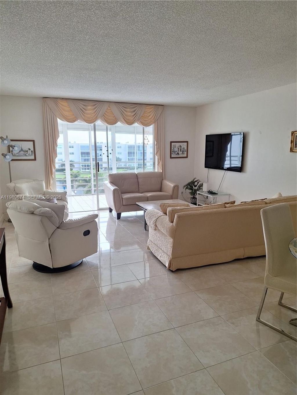 Photo of 1025 SE 3rd Ave #401, Dania Beach, FL 33004 (MLS # A11989674)