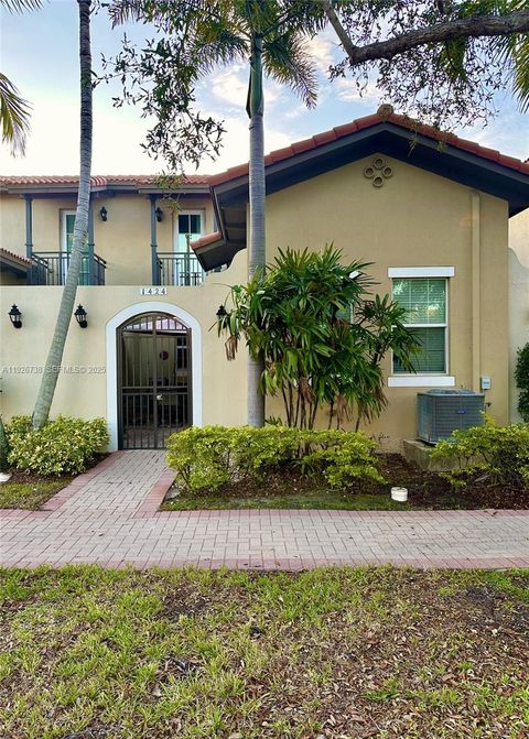 Photo of 1424 SW 147th Ave, Pembroke Pines, FL 33027 (MLS # A11926738)