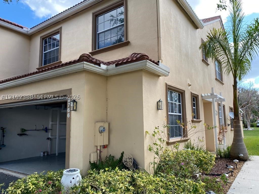 Photo of 9766 Royal Palm Blvd #19, Coral Springs, FL 33065 (MLS # A12112388)