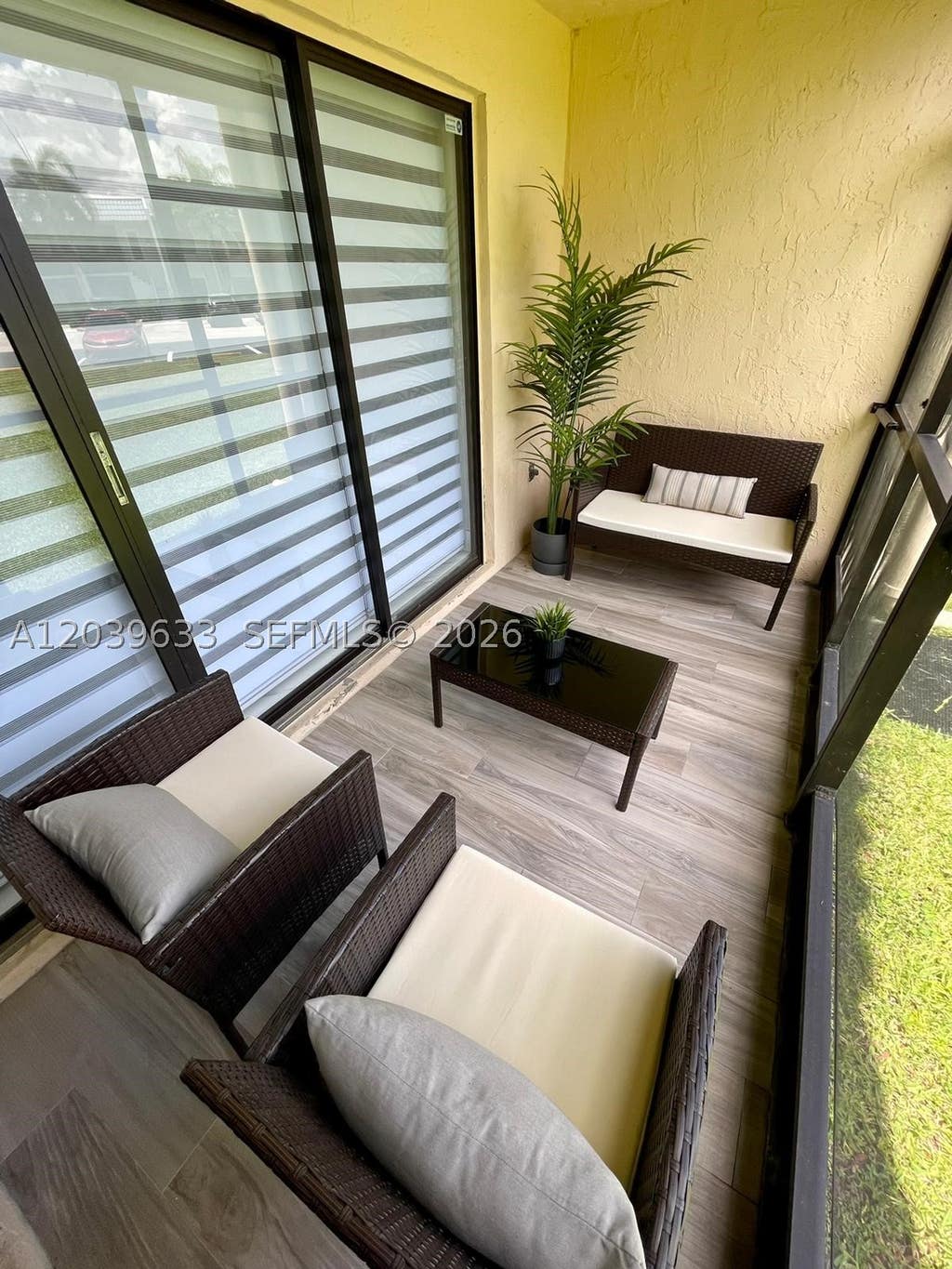 Photo of 16461 Blatt Blvd #103, Weston, FL 33326 (MLS # A12039633)