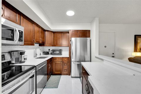 Photo of 10401 E Clairmont Cir #109, Tamarac, FL 33321 (MLS # A11877125)