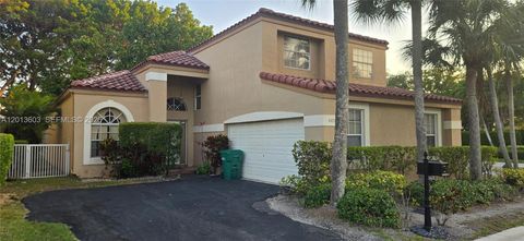 Photo of 6470 NW 77th Pl, Parkland, FL 33067 (MLS # A12013603)