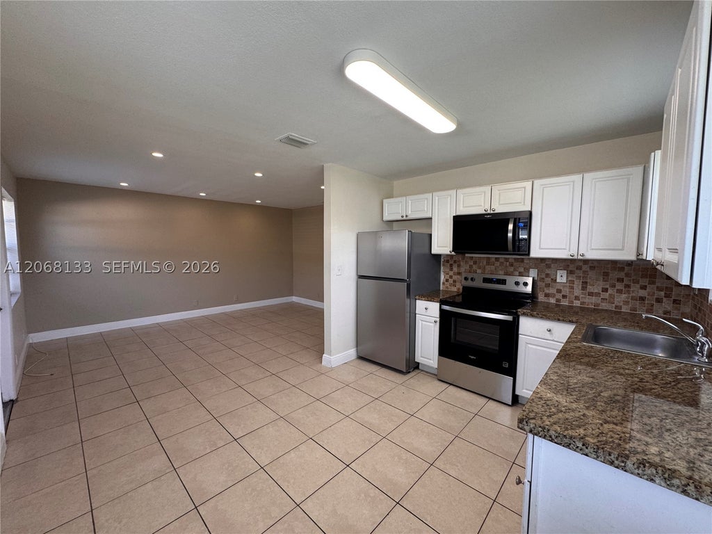Photo of 407 NW 7th Ct #S, Hallandale Beach, FL 33009 (MLS # A12068133)