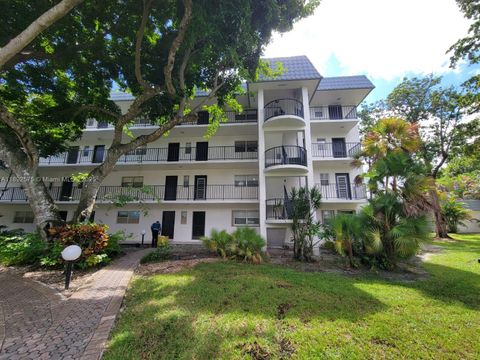 Photo of 3300 Spanish Moss Ter #403, Lauderhill, FL 33319 (MLS # A11892575)
