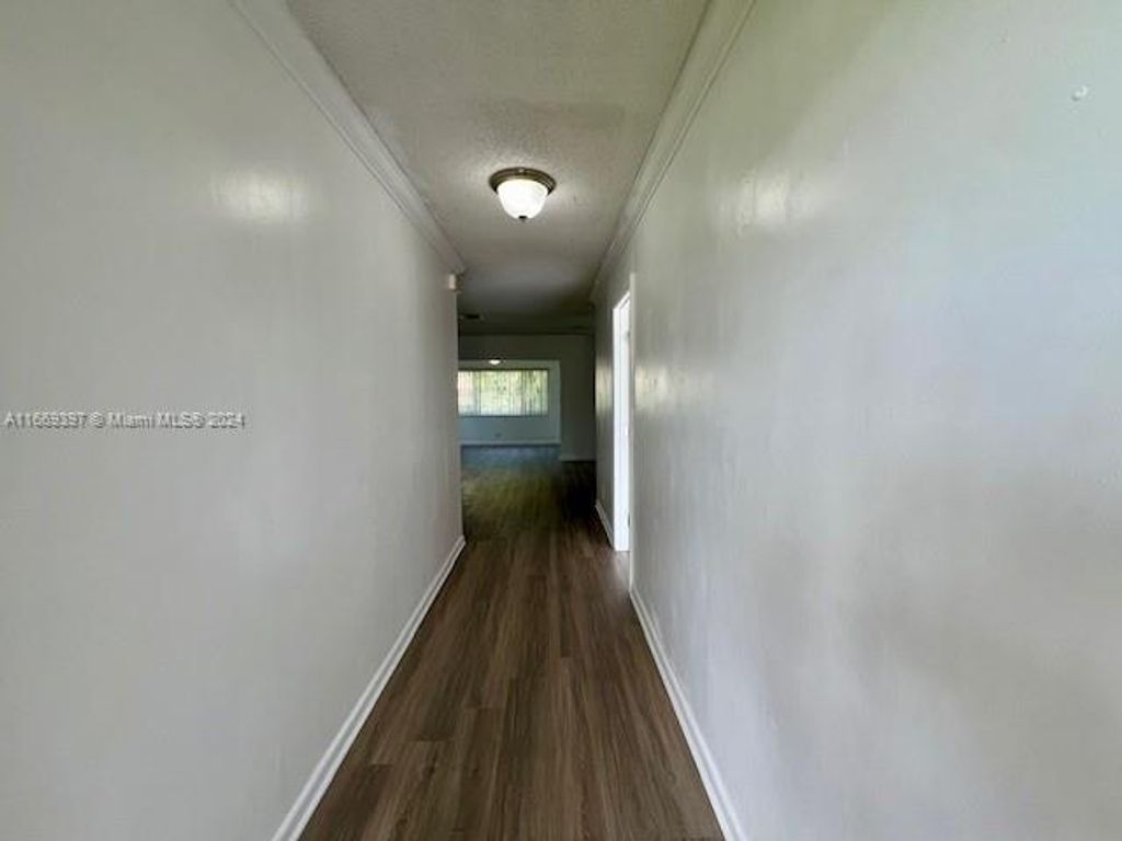 Photo of 9771 NW 23rd Ct, Coral Springs, FL 33065 (MLS # A11669397)