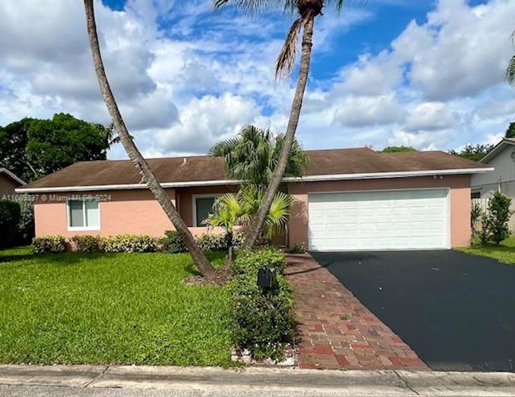 Photo of 9771 NW 23rd Ct, Coral Springs, FL 33065 (MLS # A11669397)