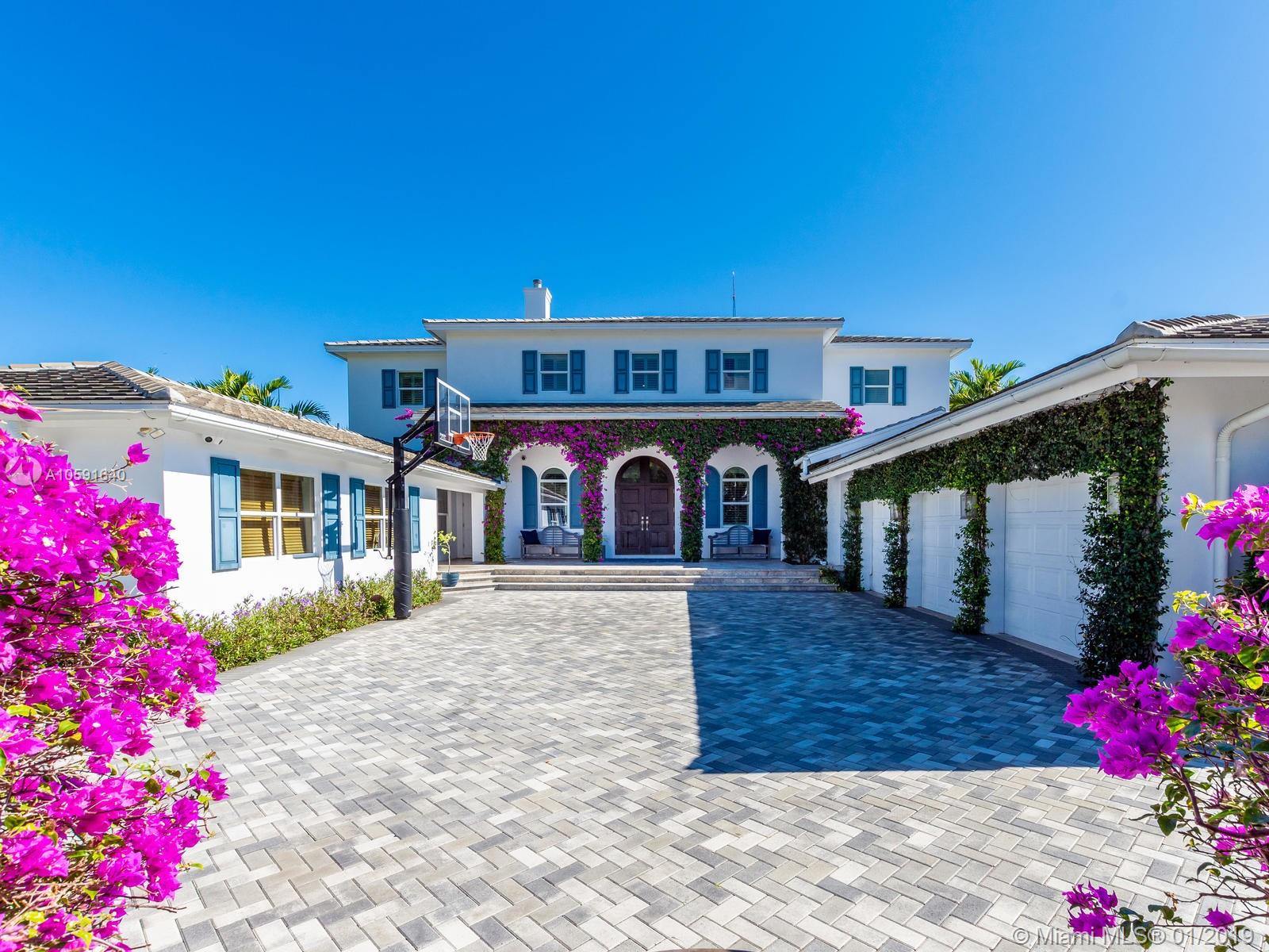 Exudes the feeling of "HOME" the minute you walk into this custom built designer British west indies style home which boasts 100' of Intracoastal Waterway, with an 80'X10' concrete dock. Complete with 6 FULL bathrooms in main house and 1 FULL bathroom in "Mother in Law Suite". Main house has 4 ensuite bedrooms, an office off of the kitchen and mudroom. The 4th bedroom has 2 bathrooms, "the bunk room", is 28'11" X 15' a total of 421.65 sqft designed to be converted into two bedrooms if needed. A wood burning fireplace in the upstairs family room. Custom built-ins. Open floor plan to maximize the Intracoastal Waterway views. Truly a unique home with top of the line kitchen and finishes throughout in the most sought out community in all of Fort Lauderdale, Sunrise Intracoastal.