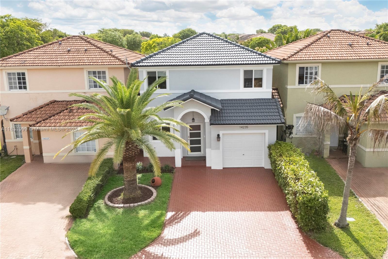 Spectacular well-maintained single-family home in a gated community at Kendall. 3 bedrooms, 2.5 bathrooms, plus a wet bar. Granite countertops, stainless steel appliances, washer & dryer, ceiling fans, Impact-resistant windows and doors installed in 2024, pre-wired for professional security camara system, tile flooring throughout the first floor & luxury laminated wood floor on the secund level. Carrier AC unit with Nest Thermostat, blinds installed in windows and doors, covered shed, fenced & paved patio. This pet-friendly community has 24/7 security guard, clubhouse, gym, pool, racquetball court, basketball & tennis court, playground & plenty guest parking spaces. Located near Costco, Zoo Miami, Walmart, Publix, 30 minutes to MIA. Must see!