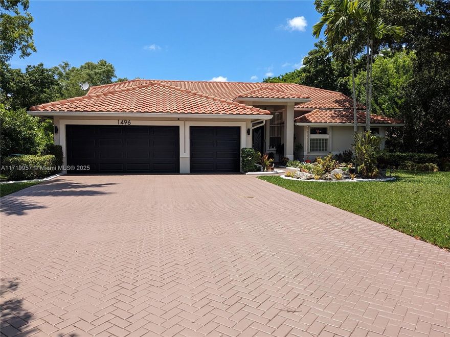 Recently renovated 6/4 and 3 car garage located on a secluded cul de sac in the prestigious guard gated, PGA rated golf course community of Eagle Trace, in Coral Springs Florida. 
14 foot ceilings throughout. Recent renovations include a total of $140,000 for new master bath, new master closet, updated kitchen, new electric blinds, hurricane shutters, resurfaced pool, and other upgrades. 3382 SqFt property
Screened in pool with oversized, 1/2 acre (21,000+ sq ft) lot.