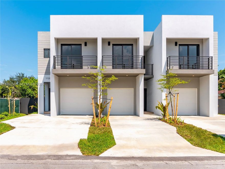 Step into this beautifully designed, recently built, modern townhome located in Fort Lauderdale's booming Lake Ridge neighborhood. This home features a unique and luxurious design with impeccable finishes throughout. Bunker like built of concrete all around, high ceiling, hurricane impact windows and doors, open patio overlooking a nice and private backyard. This home has 3 generously sized bedrooms - primary bedroom with en-suite bathroom and 2 guest bedrooms that are perfect for family, guests or a home office; a total of 2.5 bathrooms and a one car garage that is equipped for EVs as well. Kitchen has high quality stainless steel appliances, ample cabinetry and a clean and modern design. Perfect for investors: very low HOA, very low insurance, short term rentals and airbnb allowed.