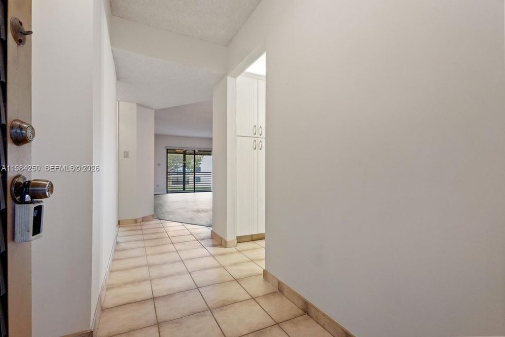 Photo of 4965 E Sabal Palm Blvd #207, Tamarac, FL 33319 (MLS # A11984250)