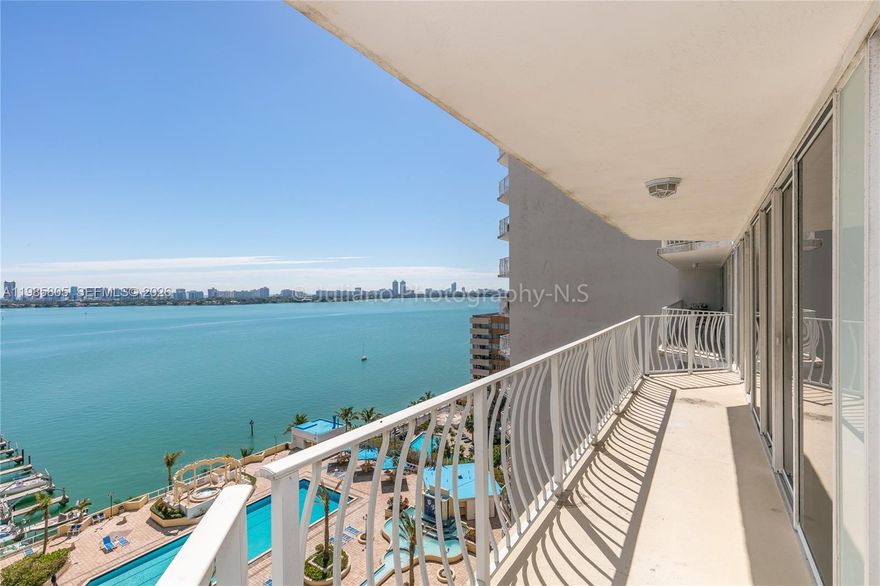 Stunning bay views set the tone for this beautifully updated 2-bedroom, 2-bath condo in desirable North Bay Village. Designed with a spacious split floor plan for added privacy, this residence features balcony access from every room, filling the space with light and showcasing the waterfront setting. The updated kitchen offers new cabinetry, stainless steel appliances, and elegant marble countertops. Enjoy resort-style living in a full-service building with 24-hour security, Olympic-sized pool, jacuzzi, and more, all just minutes from Miami Beach, Downtown, Midtown, and Aventura.