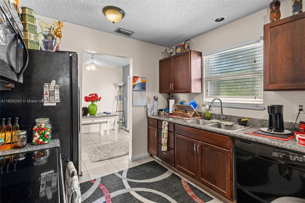 Photo of 2013 SW Aquarius Ln, Port St Lucie, FL 34984 (MLS # A11808243)