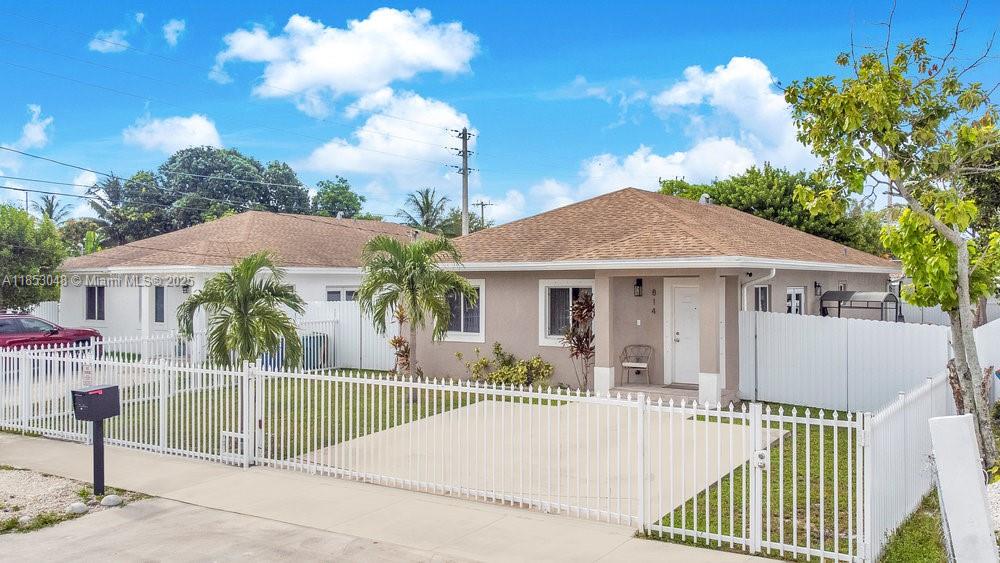 Built in 2020, this 4-bedroom, 2-bathroom home offers a spacious open layout with a large kitchen and generously sized bedrooms. The master has been converted into an efficiency with a private entrance, making it ideal for guests, in-laws, or rental income, and it can easily be converted back to a traditional 4th bedroom if desired.
Enjoy peace of mind with a 5-year-old roof and A/C. The home also includes security cameras for the exterior. The fully fenced lot features an electric gate for added privacy and convenience. Ideally located just minutes from I-95, Miami Shores, Publix, and great restaurants—this home offers comfort, flexibility, and unbeatable location!