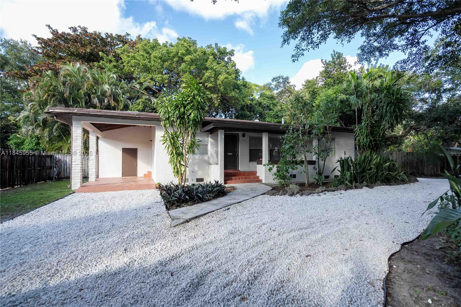 A lush, forested retreat! Just minutes to Aventura, Oleta Park, and FIU, this renovated home on a DOUBLE lot boasts a newer roof, updated electrical, a kitchen w/quartz countertop, SS appliances, cool A/C, and a modern bathroom with dual sinks. The spacious layout is ideal for families featuring a deck leading to beautifully landscaped backyard with fruit trees—all fully fenced for privacy. Step outside and immerse yourself in nature. The home also offers a separate laundry room, separate outhouse perfect for hobby/gym and ample storage. Tenant is responsible for water and landscaping ($120/m). Pets welcome. Check out the VIRTUAL TOUR!