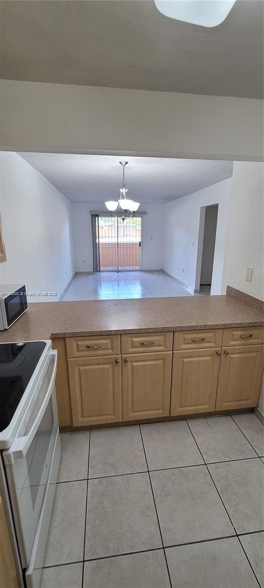 Very well located 1015 sq ft first floor corner apartment, two bedrooms and one and a half bathrooms. The building pass de 40 a 50 years certification, has a new roof and approved permit to install impact windows and doors on all units and paint the entire building. Ok to lease. Enjoy the convenience to be close to Publix, Fresco, Walmart, FIU, banks and to the Palmetto expressway.