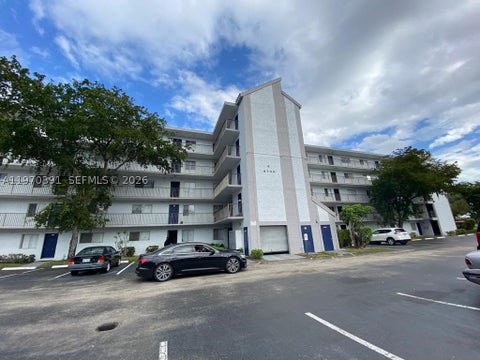 Photo of 8700 N Sherman Cir #305, Miramar, FL 33025 (MLS # A11970391)