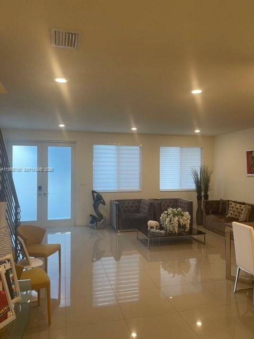 Limited opportunity—one-of-a-kind corner-unit townhouse in Doral’s community, Cosmo-Chic. Impeccable smart-generation home featuring 3 bedrooms, 2.5 bathrooms, and 1,975 sq ft of bright, open living space designed for family living.
Loaded with upgrades—no expense spared. Designer kitchen and bathrooms with quartz countertops, top-of-the-line stainless steel appliances, high-capacity, modern, premium washer and dryer, porcelain flooring, and impact-resistant windows and doors. Stainless steel stair railings and laminate flooring on the first level.
Highly desirable 3-car parking, including a private 2-car enclosed garage plus an additional space. Corner lot offers extra privacy, space, and abundant natural light.
Move-in ready and highly sought after. Enjoy resort-style amenities at the Landmark Clubhouse with pool, fitness center, tennis courts, and event spaces. Prime location near A+ schools, shopping, dining, supermarkets, and major highways.
Excellent opportunity for families or investors—strong demand, won’t last.