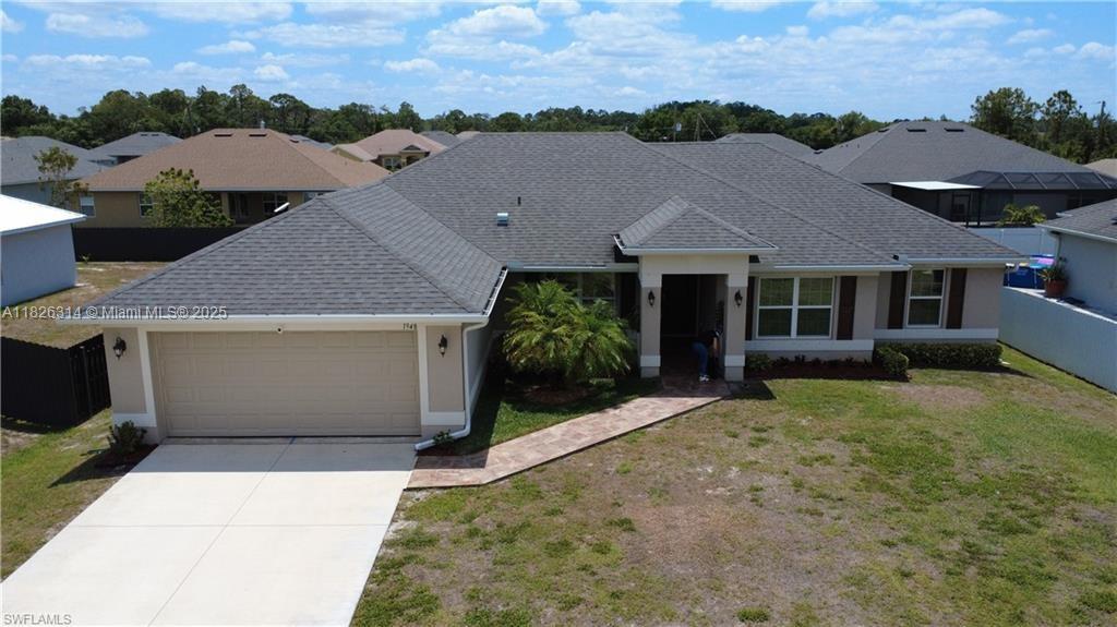 SELLERS ARE HIGHLY MOTIVATED!!!!!! and willing to assist with buyers' CLOSING COSTS $$$$! 2019 Located Greenbriar subdivision of Lehigh Acres. It features 4 spacious bedrooms, a den that can easily be converted into a 5th bedroom, 2 full bathrooms, a formal dining room, and a large laundry room. The home is enhanced with modern light fixtures, plantation shutters, and a screened-in porch, perfect for relaxing Florida evenings. With its quiet location and exceptional layout, this home delivers the space, comfort, and value you've been searching for. This house offers much more. Come and see it by yourself, you will fall in love with this beautiful home, which is waiting for the perfect new HomeOwner. Don't miss this opportunity—schedule your showing today!