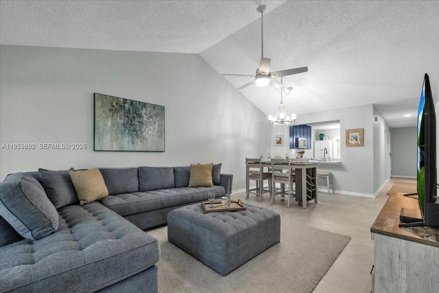 LOCATION, LOCATION, LOCATION… Escape to your very own AFFORDABLE BEACH TREAT, LESS THEN 4 MILES TO THE BEACH or BIKE to the Greenway & Baker Park! This 3 bedroom, 2 bathroom, spacious condo has an UPDATED bright & cheery kitchen w/ stainless steel appliances, quartz countertops, pantry cabinets, pull-out trash cans & custom breakfast table. Entertain w/ ease in your open floor plan plus VAULTED ceilings in the living & dining room.  A NEW sectional that fits the space so beautifully stays w/ the purchase of this home. All living space flooring has been UPDATED LVT w/ P90 underlayment & all bedrooms have NEW luxurious carpet. Enjoy tranquil WATER & FOUNTIAN VIEWS from your screened in lanai...Making this place a perfect winter getaway or full-time residence!!! Timber Lake is a surprise w/ a Club House, Pool & tennis court, this small complex is tucked away but yet in the middle of everything close by! Book your private showing