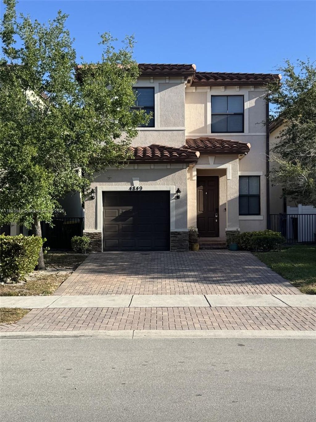 Photo of 4849 NW 57th Ct, Tamarac, FL 33319 (MLS # A11893547)