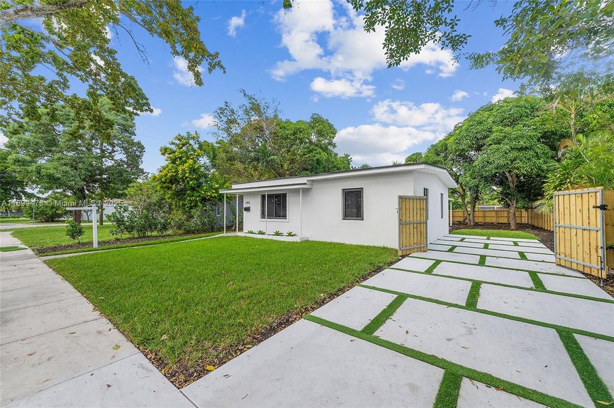 This fully renovated 3-bedroom, 2-bathroom home in North Miami is a must-see, centrally located with ultra-quick access to I-95; it boasts all-new features including a new roof, A/C, impact windows and doors, a new fence, and a concrete driveway. Inside you'll find an updated kitchen with new stainless GE appliances and soft-close cabinets, two new bathrooms, and a new GE washer and dryer, all set on a spacious lot with a backyard that has room for a pool.