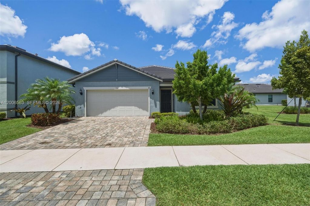 Photo of 3141 Poinciana St, Lauderdale Lakes, FL 33311 (MLS # A12006563)