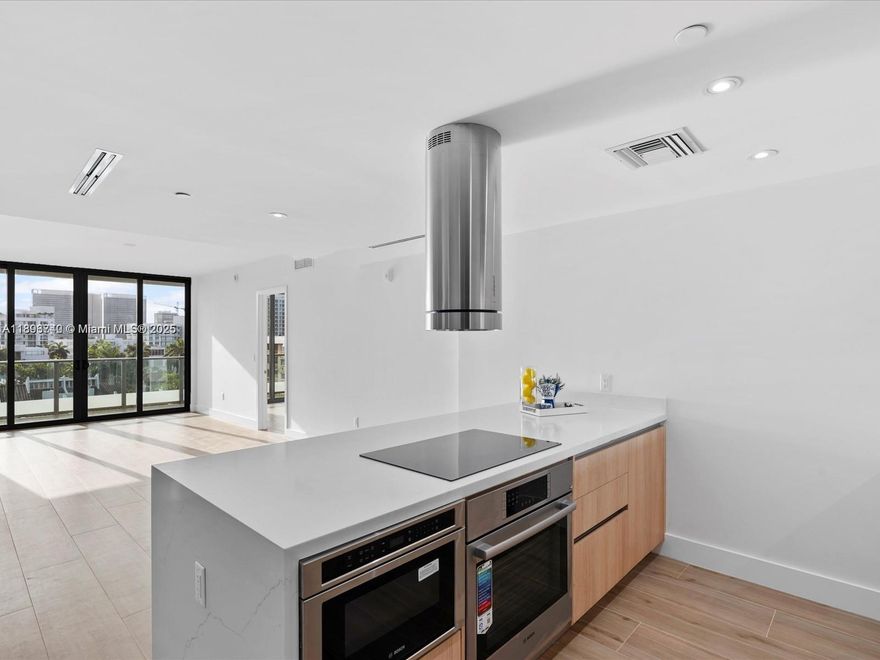Experience elevated island living in this exquisite 2 Bed, 2 Bath + Den residence in a stunning new building in Bay Harbor Islands. This east-facing home features porcelain floors, an open-concept European kitchen with Bosch appliances, and elegant oak cabinetry. Enjoy keyless entry and resort-style amenities including a rooftop pool, sundeck, whirlpool, summer kitchen, Zen gardens, fitness center, and resident lounge. Just minutes from pristine beaches, Bal Harbour Shops, local cafés, boating, tennis courts, and a top-rated public school. Live where luxury meets laid-back island charm.