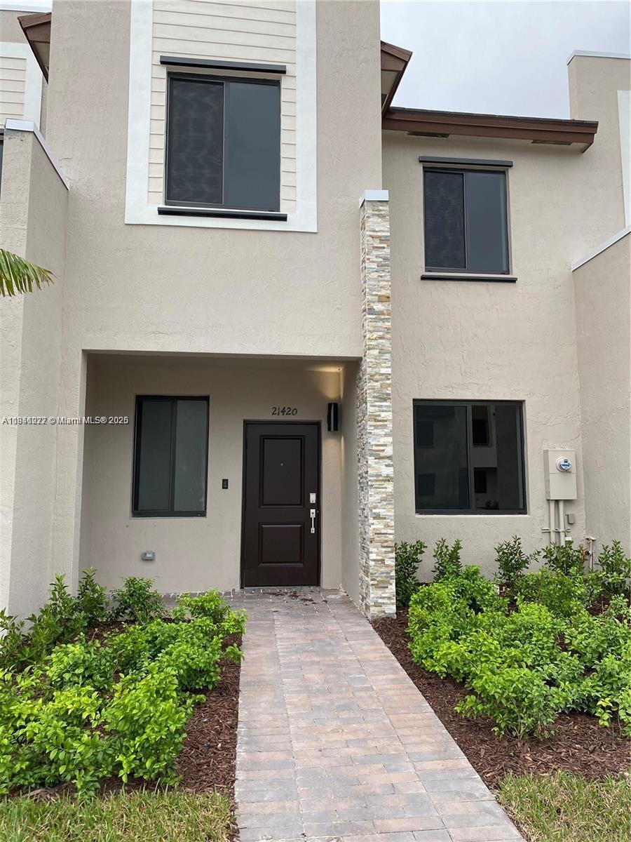 Marbella Model Townhouse in Via Ventura!
Discover this elegant 2-story townhouse featuring 3 bedrooms, 2.5 bathrooms, a fully equipped kitchen with stainless-steel appliances, spacious living areas, and a cozy family room. Enjoy the convenience of in-home laundry, a private patio, and parking for 2 cars.
Located in a secure gated community just 10 minutes from Aventura Mall and minutes from beautiful beaches, this 2020-built home offers comfort, style, and a great location.
Priced to sell! Home needs some TLC to update the flooring to your taste and is being sold as-is. Don’t miss this excellent opportunity to personalize and add value to a solid, modern property.