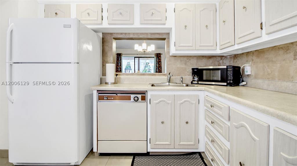 Photo of 4000 NW 44th Ave #306, Lauderdale Lakes, FL 33319 (MLS # A12006129)
