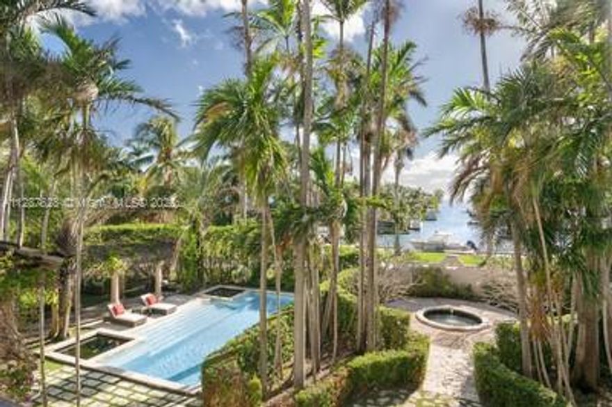 One of the most important designs by famed Miami Architect Walter Degarmo, this stunning 6 bedroom, 6.5 baths Mediterranean estate continues to embody old world charm after being restored in 2002. Nestled on a private gated 28,577sf double lot in Coconut Grove’s exclusive guard/gated waterfront community - The Moorings. This 6,268sf home evokes nostalgia through expansive light filled rooms, original Cuban terracotta floors, 3 original fireplaces and vaulted wood beam ceilings. Breathtaking views from multiple open balconies overlooking the bay and yacht basin. Features enchanting court yards, lush tropical gardens, Lily ponds, pool and 1 bed/1 bath Guest House. Seconds to restaurants, shopping and biking trails. Landscape by award winning Sanchez and Madux. Community dock/Riparian rights.