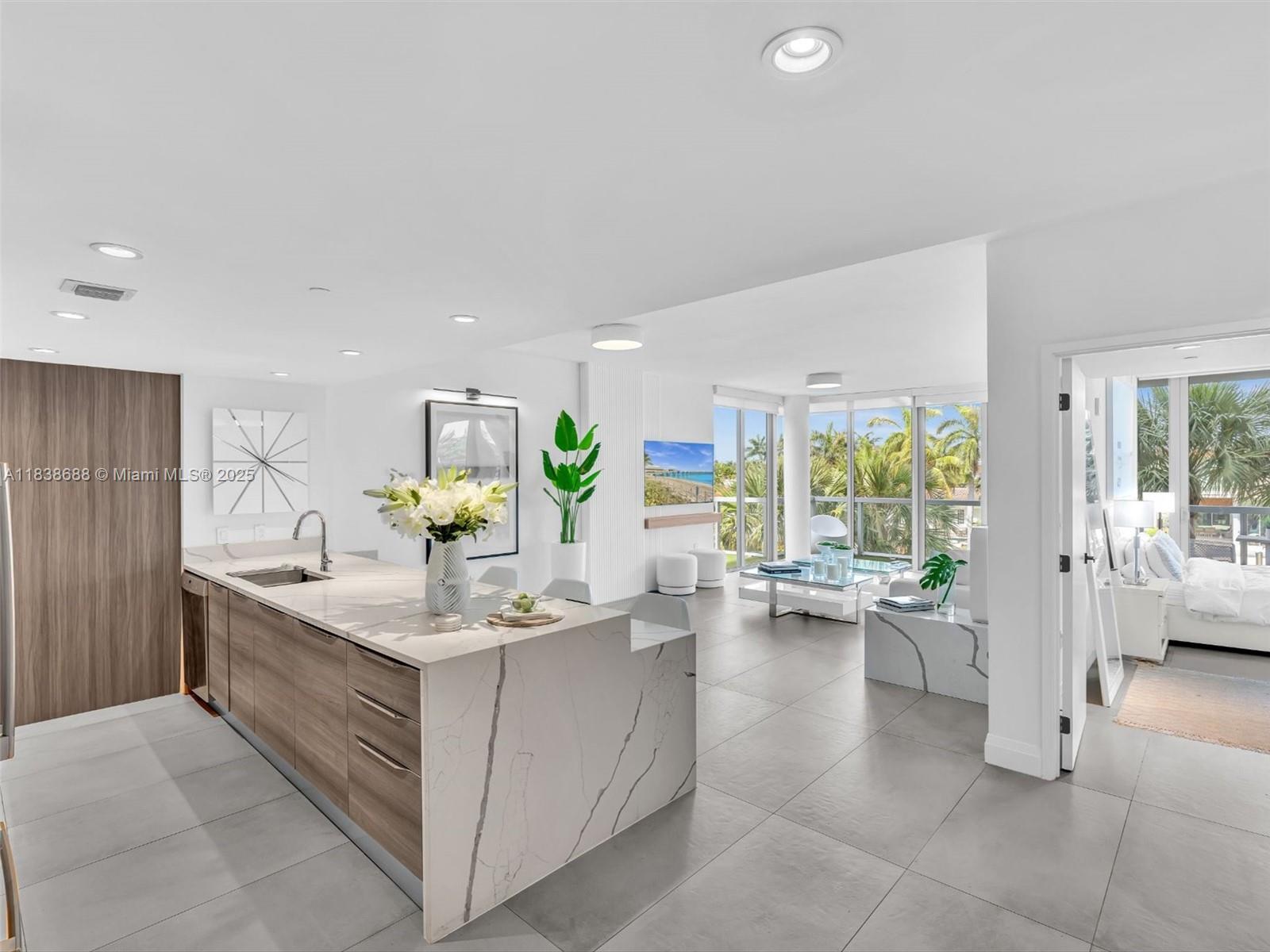 Have you ever dreamt of living on an island? Welcome to Bay Harbor Islands.
This exceptional 3-bedroom corner waterfront gem at KAl isn't just a condo, it's a quiet escape. Your private balconies offer a front-row seat to glowing sunsets over calm waters. Inside, minimalist elegance flows effortlessly, with every detail whispering luxury.
The layout flows, grounded, alive. Boat lover? The building offers a marina with slips. It's not just rare, it's one of a kind.
Nothing else on the island lives quite like this. Will you?