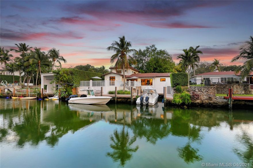 Ever dream of going on a sunset cruise from the comfort of your home? Well this is it! An exquisite gated 5 bed/4 bath pool home fully renovated in 2017 w/the Mahi canal of the South Coral Gables waterway as its backyard. Equipped w/a private dock & 75' of water frontage + a cut out, it has serene details throughout. A Mahogany impact door greets you to a charming sitting area & a vaulted ceiling Family Room. All bedrooms have walk-ins. The 1st floor has a Master bedroom w/patio pool deck access & 2 walk-ins + 2 more bedrooms w/1 as an en-suite. On the 2nd floor are 2 bedrooms w/a Jack & Jill bath w/separate shower & soaker tub. Others: PGT impact windows, Subzero/Wolf appliances, custom kitchen/bath cabinets, marble counters, 2-car garage, a laundry room & Azek flooring for dock/patio.