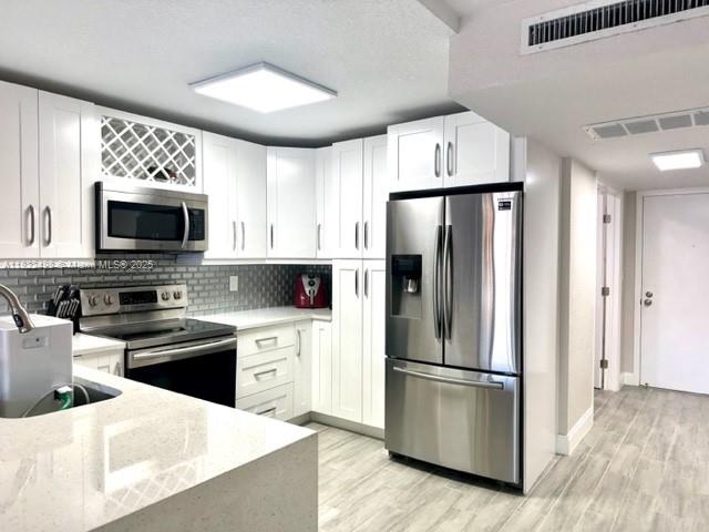 1 Royal Palm Way 203