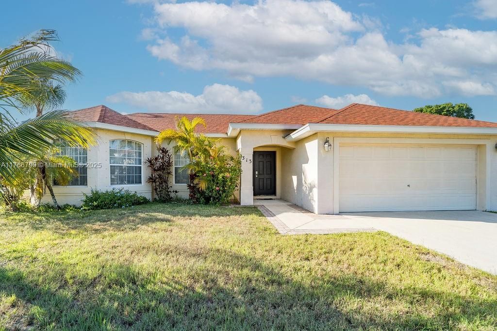 Photo of 313 SE Husted Ter, Port Saint Lucie, FL 34983 (MLS # A11786790)