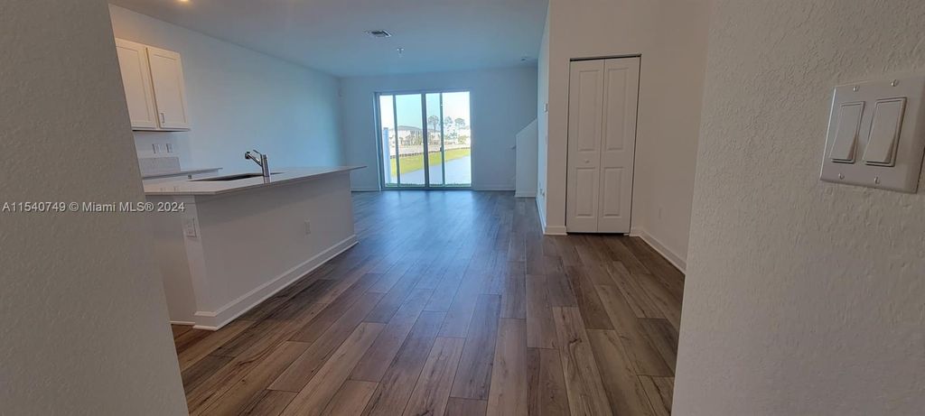 Photo of 855 SE Grovebush Ln, Port Saint Lucie, FL 34984 (MLS # A11540749)