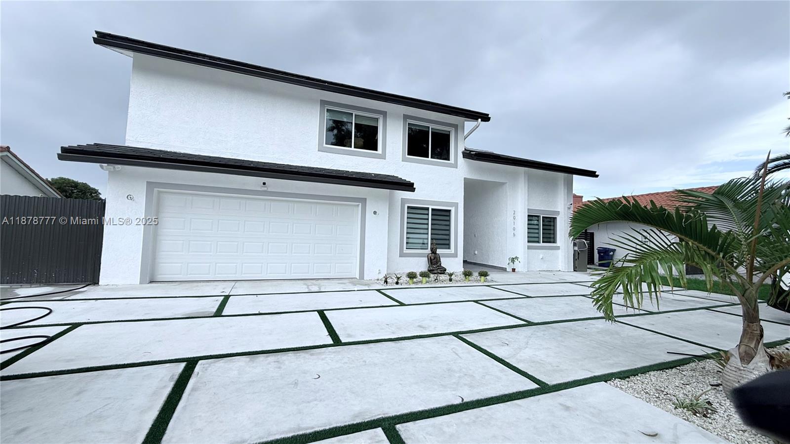 Stunning 6-bedroom,3-bath home fully remodeled with spacious bedrooms, a beautiful yard, and space for a boat. Features include a new roof, impact windows, a gorgeous quartz kitchen, new driveway, and ceramic floors throughout. Bright, open spaces make this move-in ready home perfect for families seeking comfort, style, and outdoor living.