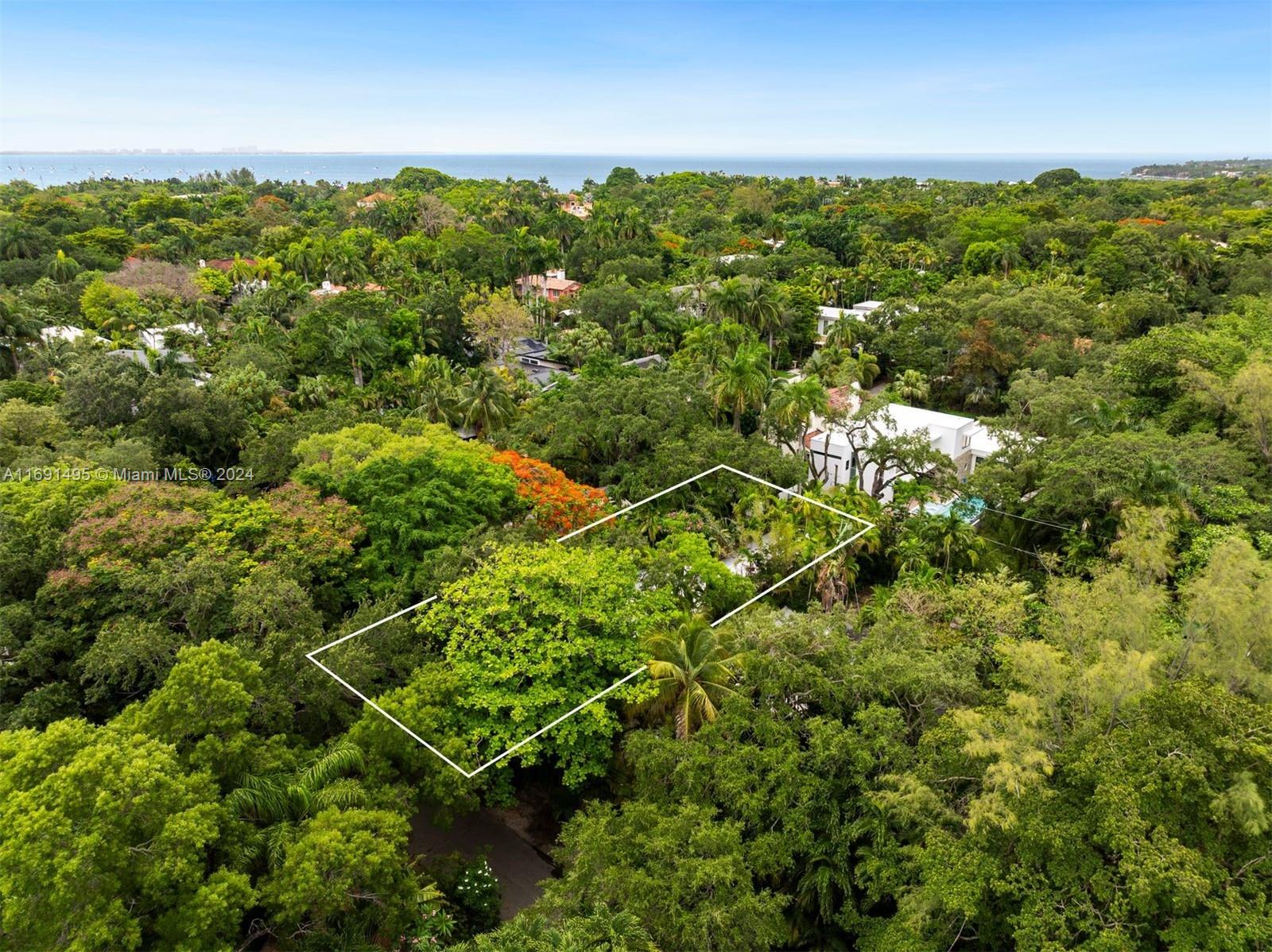 Prime development opportunity in the heart of Coconut Grove! This 7,000 SF lot offers incredible potential with a full set of architectural plans included. The property currently features a historic 4 bed / 3 bath home built in 1919, which could be renovated or reimagined. Situated in a highly sought-after area, this lot is minutes from Coconut Grove’s top dining, shopping, parks, marinas, and schools. Ideal for those looking to build a custom residence in one of Miami’s most coveted neighborhoods.