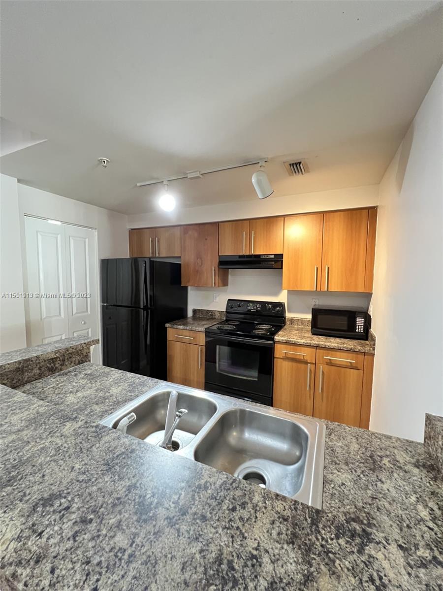EL-AD POINCIANA CONDO - Residential