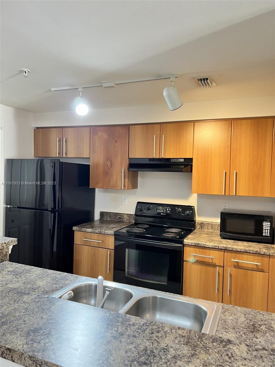 EL-AD POINCIANA CONDO - Residential