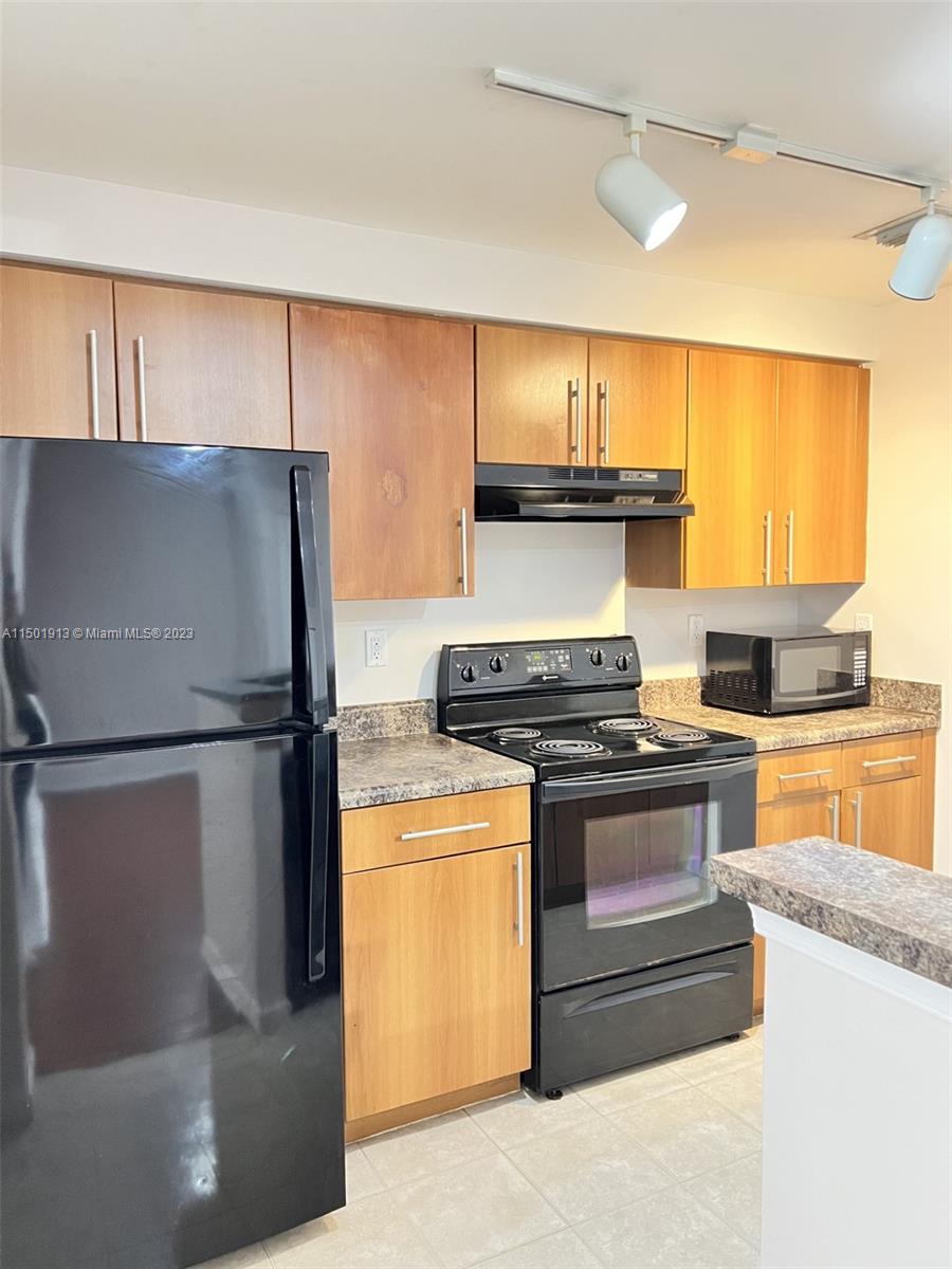 EL-AD POINCIANA CONDO - Residential