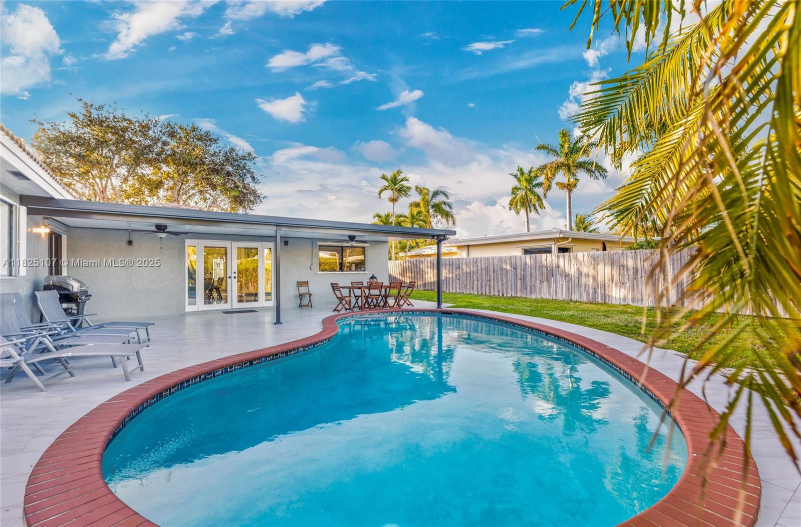 Charming turnkey home in the heart of Imperial Point neighborhood. This home features an open floor plan with 4 large bedroom and 3 full bathrooms, large kitchen and extra living area, currently being used as playroom, New 2 zone a/c ,new pool heat pump, tile roof 2015,Large pool deck awning ,huge back yard with big outdoor shed. Comes completely furnished