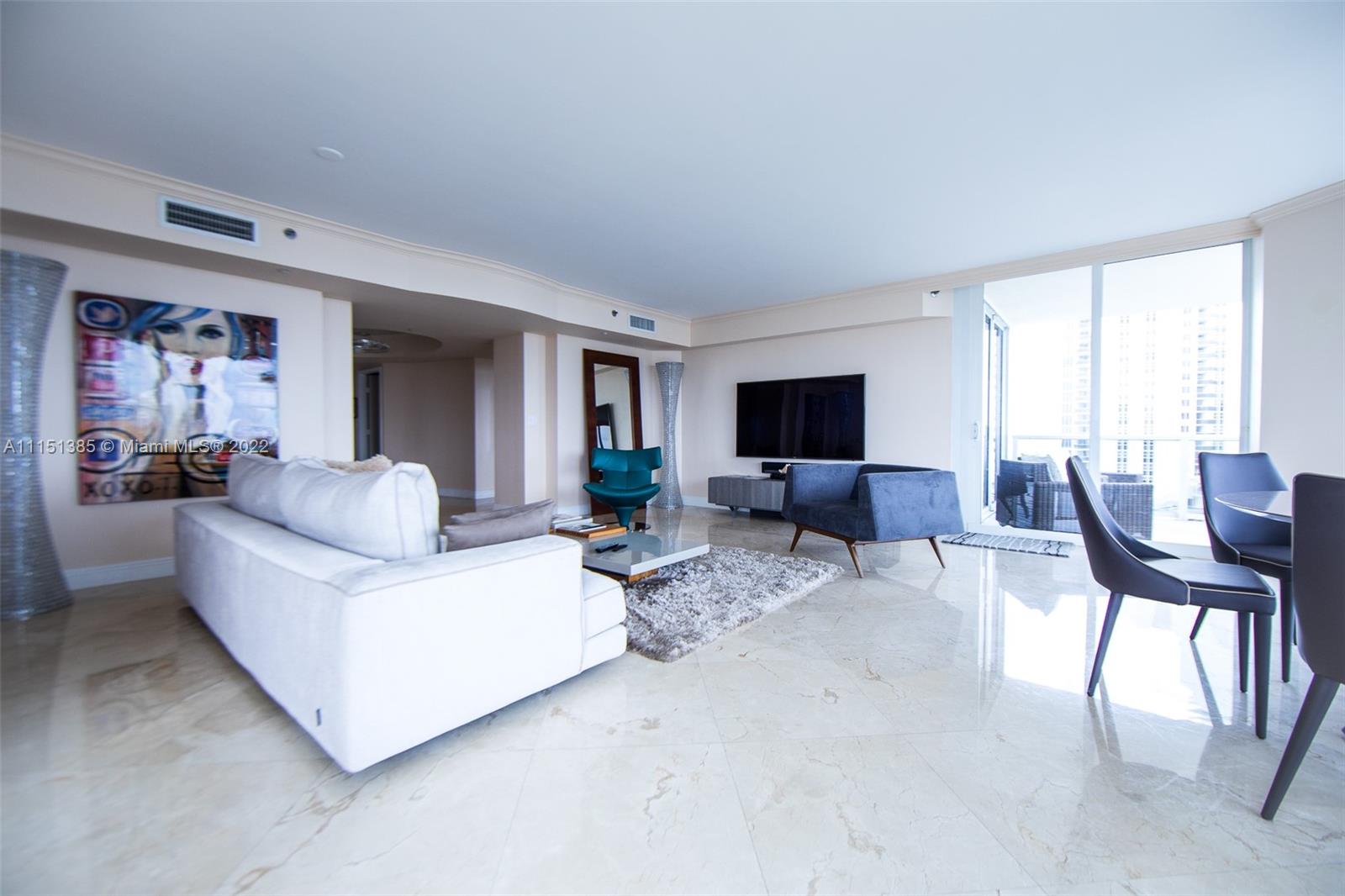 Large 3 bedroom with huge living room facing the ocean, both sides of unit have terraces facing the ocean and the intracoastal water way ,plenty of space in all rooms. Large eat in kitchen granite counters. Building has 5 star amenities. Heated pool, spa fitness center, party room, restaurant by the pool and tennis courts. Right next to golden beach and across from new park.