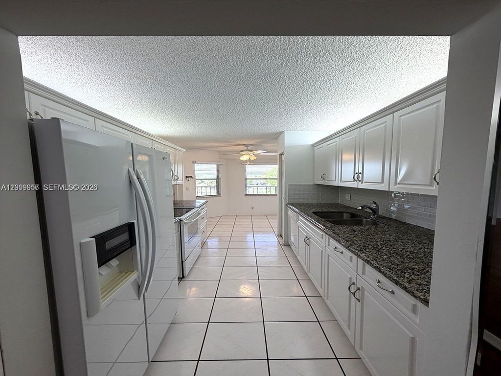 Photo of 1400 SW 124th Ter #402Q, Pembroke Pines, FL 33027 (MLS # A12009016)