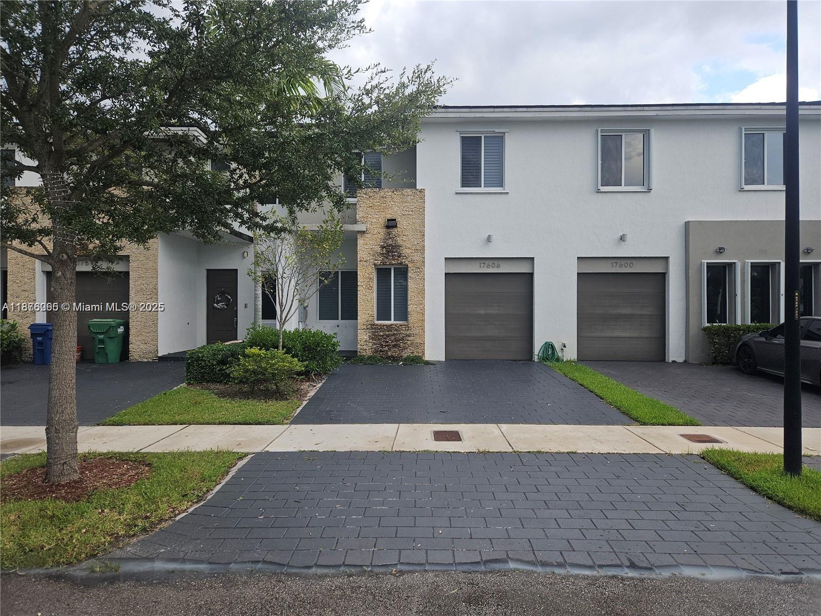 Stylish townhouse unit boasting 1,979 sqft of open spaces and outdoor entertaining spaces. Enter through the front door to find a freshly painted comfortable modern living spaces, sleek tile flooring, and a seamless flow out to the back patio area. Entertain with ease in the gourmet kitchen equipped with stainless steel appliances, stunning quartz countertops and the breakfast bar island. This unit has a total of 3 parking spaces, one inside the garage and two in front. Amenities include Clubhouse, Pool, Exercise Room, Landscape of common areas, garbage and recycle pick-up and Security Patrol.