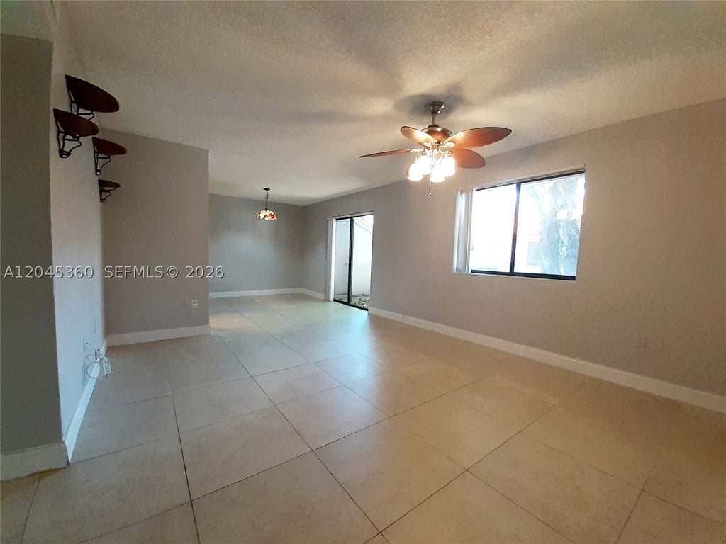Photo of 8407 Coral Lake Mnr #8407, Coral Springs, FL 33065 (MLS # A12045360)