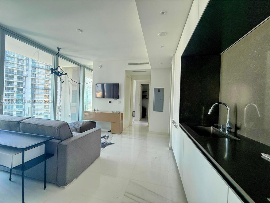 Iconic 33rd-Floor Custom Residence | Aston Martin Residences
Experience panoramic city and bay views from this meticulously upgraded 1BD + 1 1/2 bathrooms home. Featuring custom millwork, an open-concept layout, and access to world-class amenities including a full-service spa and indoor pools this is luxury waterfront living, perfected.